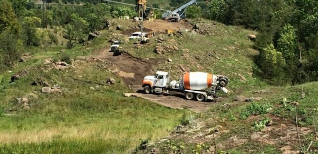 concrete truck climbing a hill